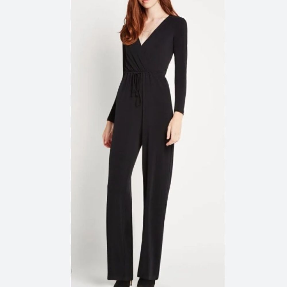 BCBGeneration black surplice jumpsuit. Size xs